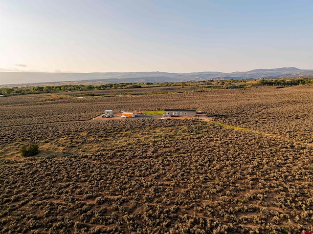 bird's eye view with a rural view and a mountain view