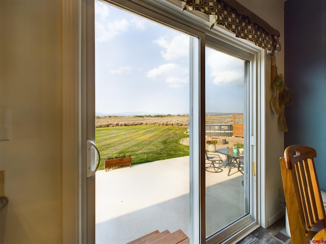 entryway featuring a rural view