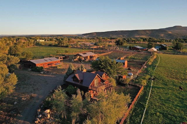 bird's eye view featuring a mountain view and a rural view