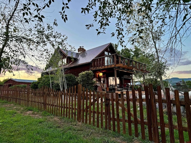 view of property exterior at dusk