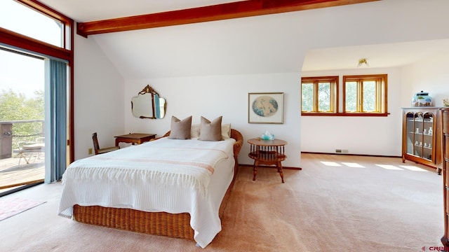 carpeted bedroom with multiple windows, access to exterior, and vaulted ceiling with beams