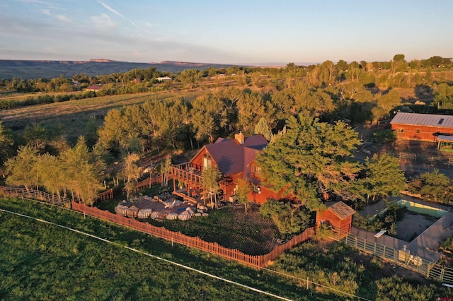 birds eye view of property featuring a rural view