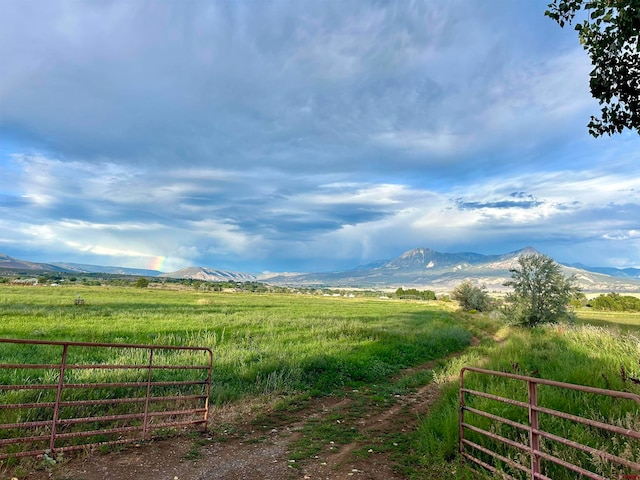 exterior space with a rural view and a mountain view