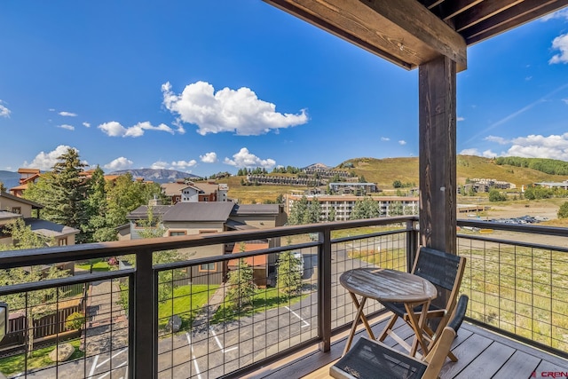 balcony featuring a mountain view