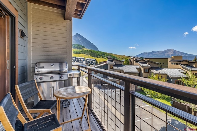 balcony featuring a grill and a mountain view