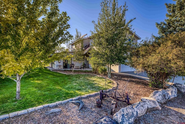 view of yard with a patio area