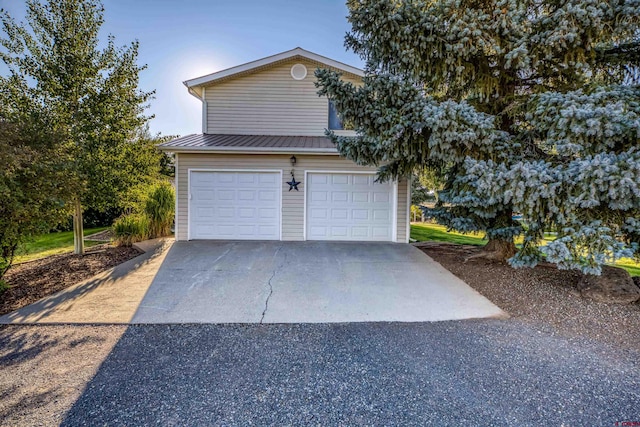 exterior space featuring a garage