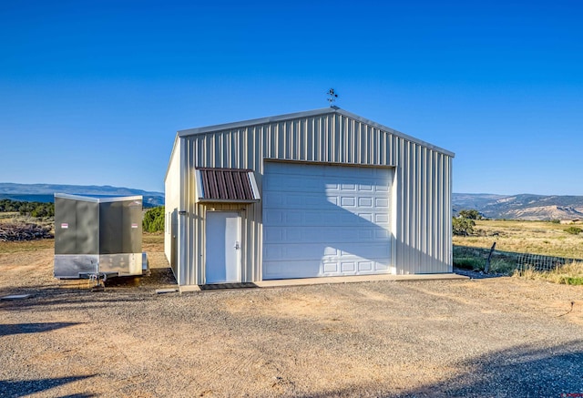 garage featuring a mountain view