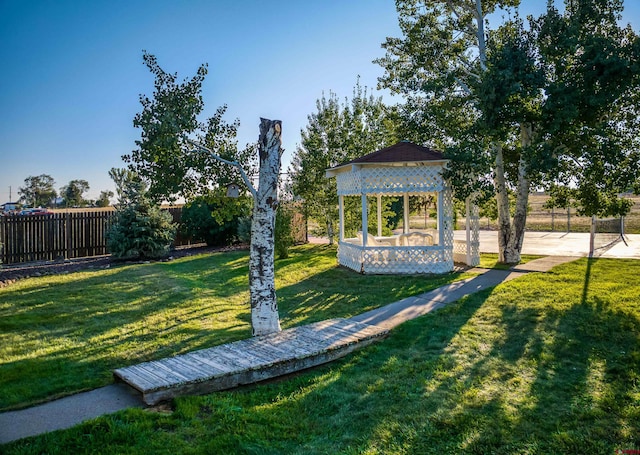 view of community with a yard and a gazebo