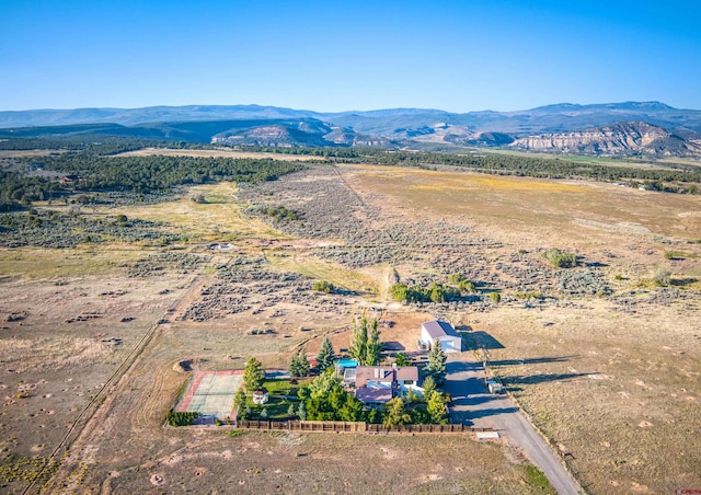 aerial view featuring a rural view and a mountain view