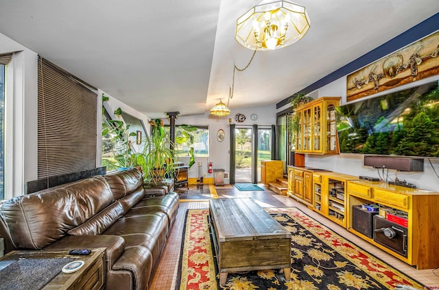 living room featuring an inviting chandelier