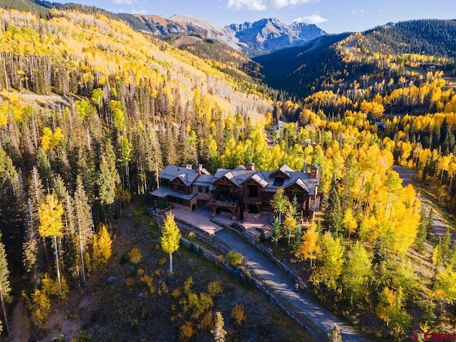 drone / aerial view featuring a mountain view