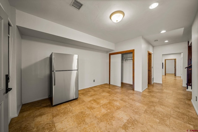 kitchen featuring stainless steel refrigerator