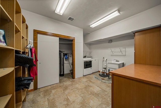 washroom with washing machine and dryer