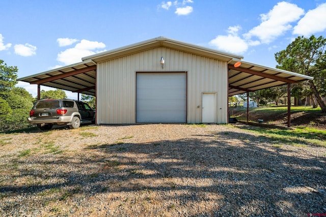 garage with a carport