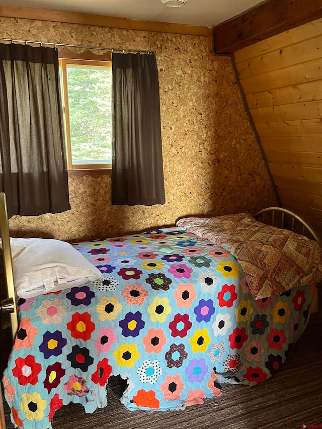 bedroom featuring beam ceiling