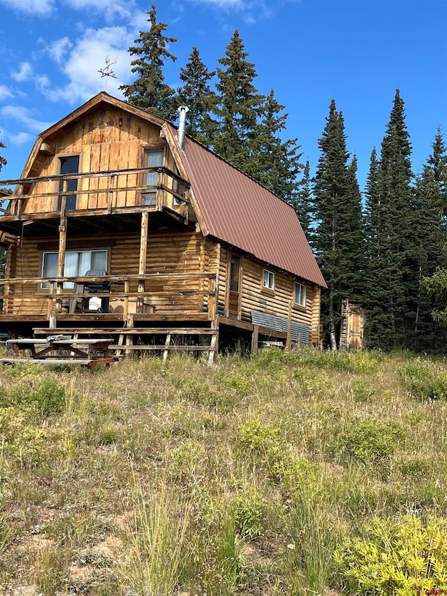 view of front of home with a deck