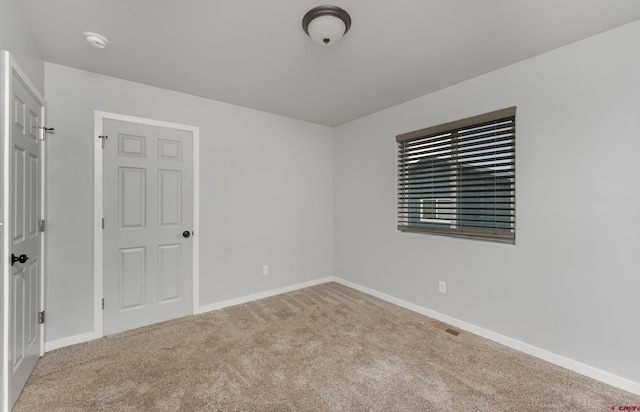 unfurnished bedroom featuring carpet flooring