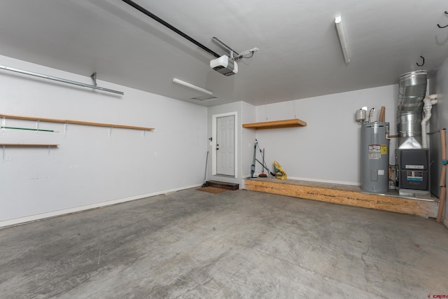 garage with electric water heater and a garage door opener