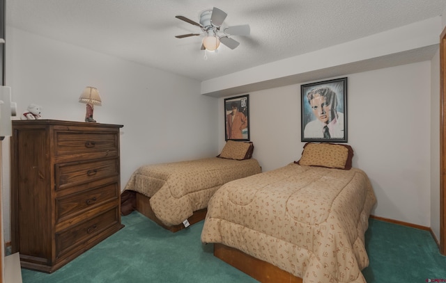 bedroom featuring a textured ceiling, ceiling fan, and carpet flooring