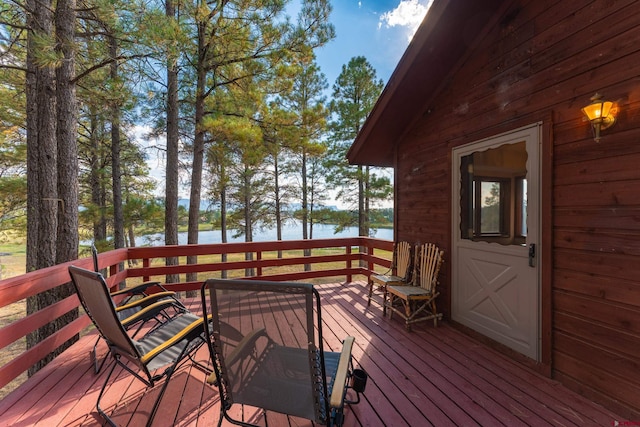 deck featuring a water view