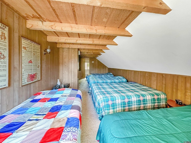 carpeted bedroom featuring vaulted ceiling with beams, wood ceiling, and wood walls