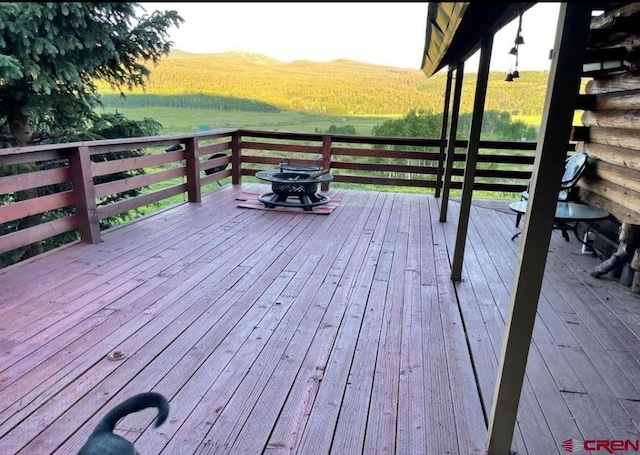 wooden terrace with a rural view