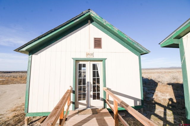 view of outdoor structure with french doors