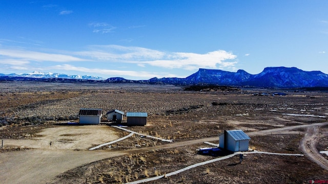 drone / aerial view featuring a mountain view