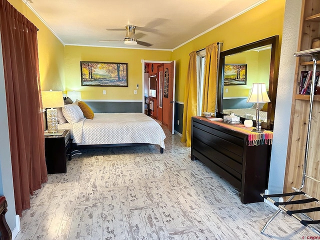 bedroom featuring ornamental molding, ceiling fan, and light hardwood / wood-style floors