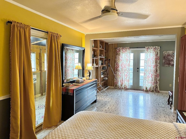 unfurnished bedroom with ceiling fan, access to exterior, crown molding, french doors, and a textured ceiling