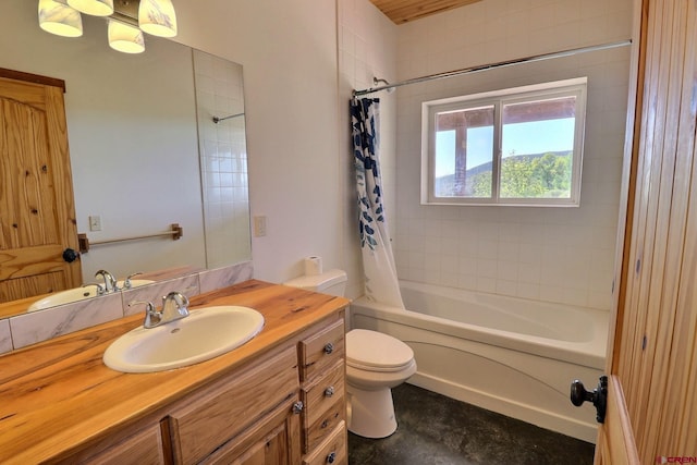 full bathroom with vanity, shower / bath combo with shower curtain, and toilet