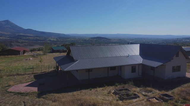 exterior space featuring a mountain view