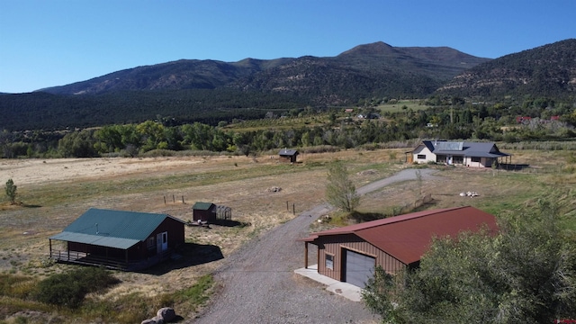 view of mountain feature with a rural view