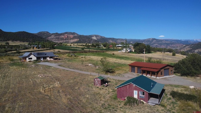 mountain view featuring a rural view