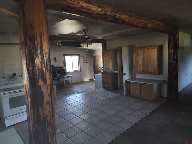 kitchen with white electric stove, light tile patterned floors, beamed ceiling, and ceiling fan