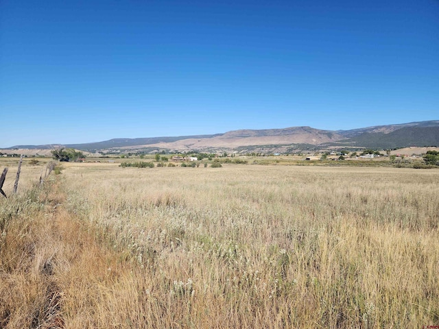 view of mountain feature featuring a rural view