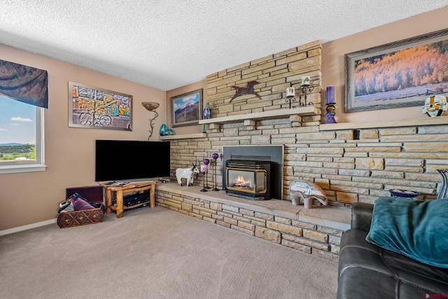 carpeted living room with a textured ceiling and a stone fireplace