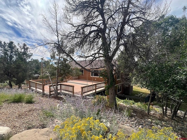 exterior space with a wooden deck