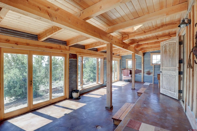 unfurnished sunroom with wood ceiling and vaulted ceiling with beams