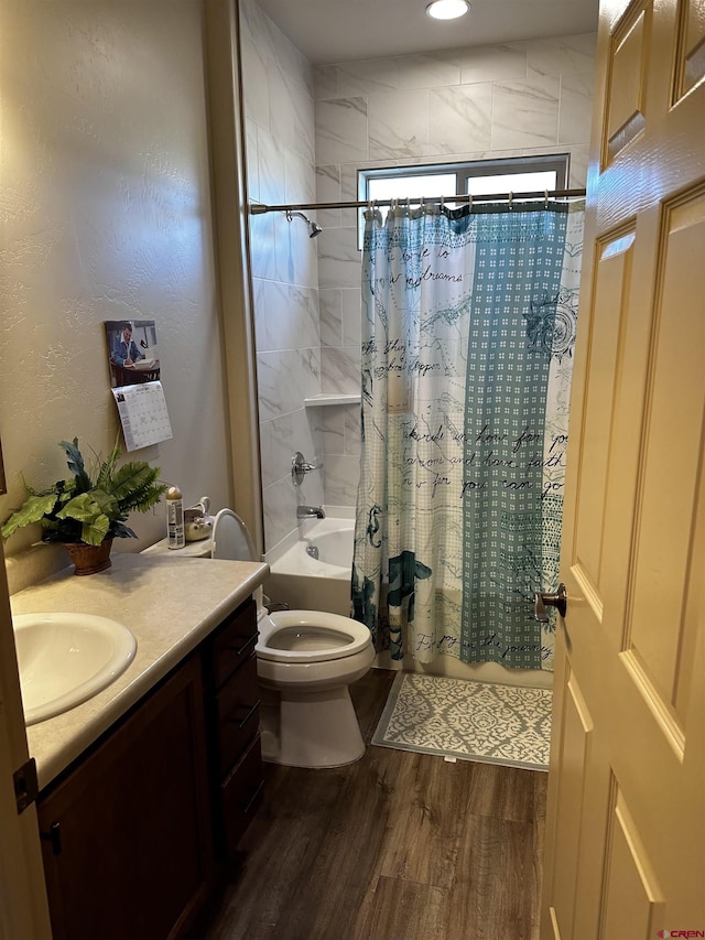 1427 Rainier Ln, Delta, CO 81416 - bathroom with wood finished floors, shower / bathtub combination with curtain, toilet, and vanity