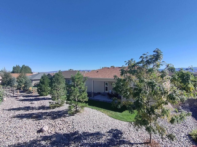 view of property exterior featuring a patio area