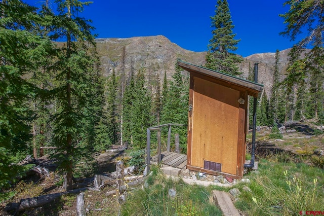 view of outdoor structure with a mountain view