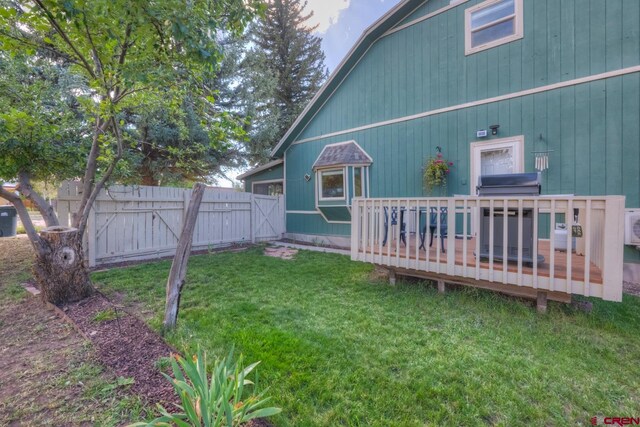 view of yard featuring a deck