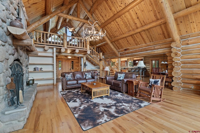 living room featuring high vaulted ceiling, wooden ceiling, a fireplace, hardwood / wood-style floors, and a wealth of natural light