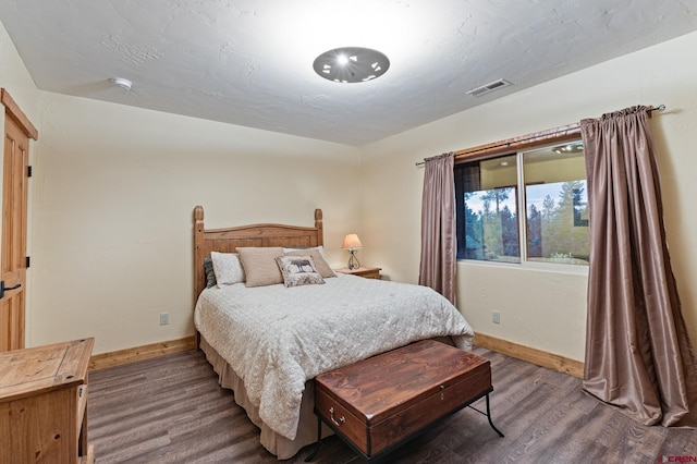 bedroom featuring hardwood / wood-style floors