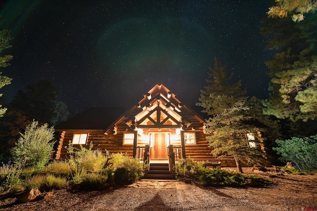 view of log cabin