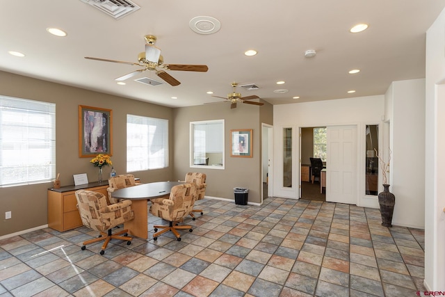 dining space with ceiling fan