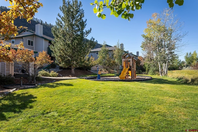 view of yard with a playground