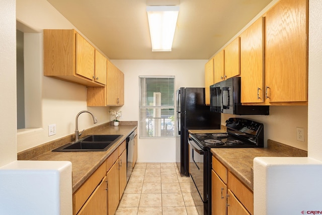 kitchen with light tile patterned flooring, sink, and black appliances